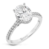 This 18k white gold engagement ring is perfect for an oval center stone, accented by .32 ctw of white diamonds.