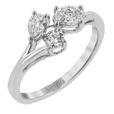 Our modern update on the three stone ring, this piece features a round, pear, and oval diamond brought together in a stunning design.