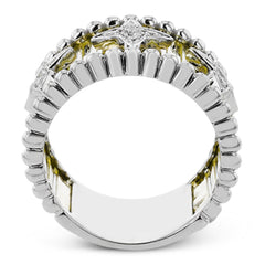 Make a statement in this fashion ring with 18K strands of rose gold adorned with .30 ctw diamonds inside a flower pattern, and white gold beaded edge