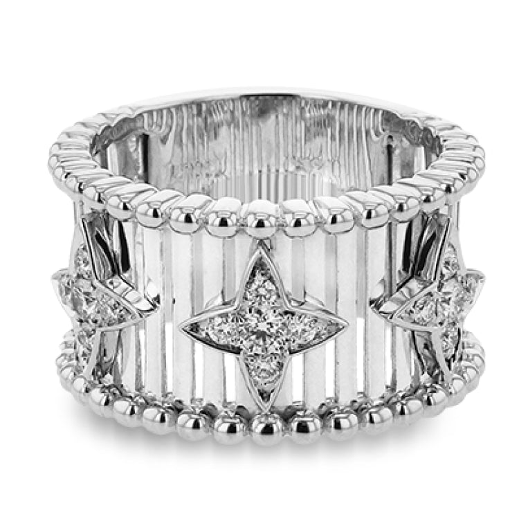 Make a statement in this fashion ring with 18K strands of rose gold adorned with .30 ctw diamonds inside a flower pattern, and white gold beaded edge