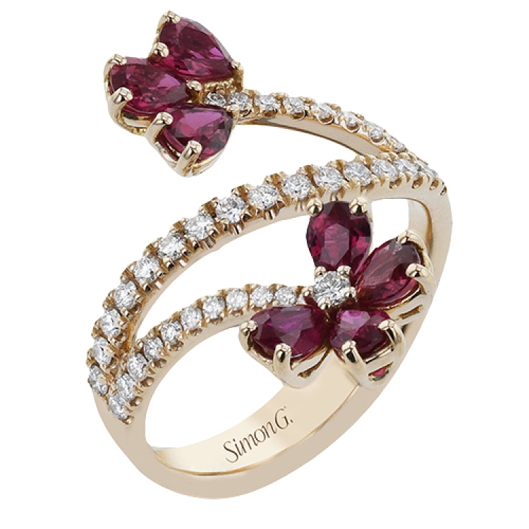 This right hand ring wraps the finger in 0.41 ctw. of diamonds set in 18K rose gold, and is adorned with petals of pear-shaped Rubies 1.52 ctw.