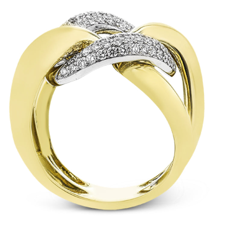 A modern take on the love knot this right hand ring in 18K yellow and white gold, features interlocking links of high polish gold and a diamond link 0.79 ctw.
