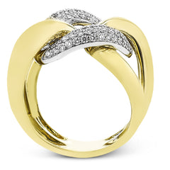 A modern take on the love knot this right hand ring in 18K yellow and white gold, features interlocking links of high polish gold and a diamond link 0.79 ctw.