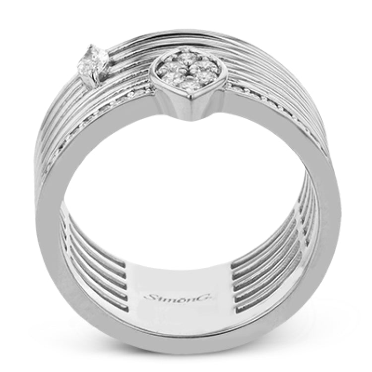 This rose/white 2tone cigar band has an open weave design and features a single MQ diamond .10 ctw., and a marquise shaped station with 0.27 ct. of RD diamonds.