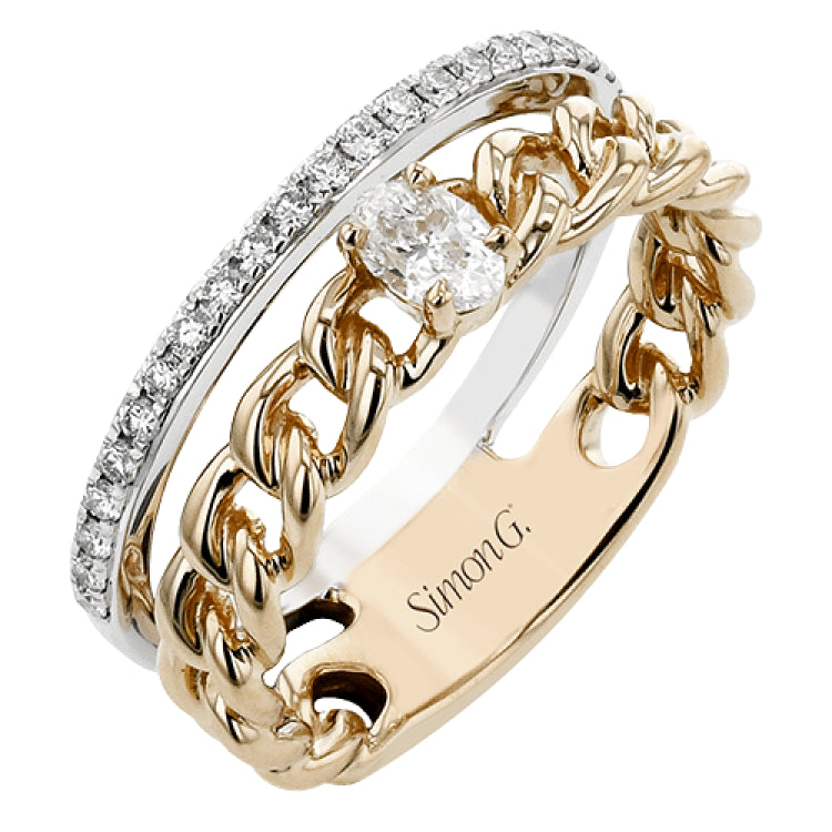 This modern right hand ring from our chain link collection, combines two looks & features a 0.21 ctw oval diamond set in yellow gold links, lined by a white gold band of RD diamonds 0.20 ctw.