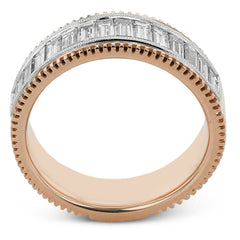 This two-tone right hand ring has a ribbed yellow gold band and sparkles with a row of baguette diamonds 1.0.7 ctw, accented by a delicate white gold beaded channel.