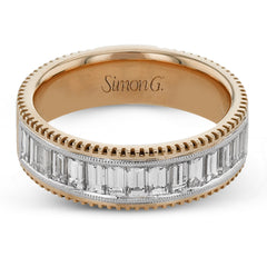 This two-tone right hand ring has a ribbed yellow gold band and sparkles with a row of baguette diamonds 1.0.7 ctw, accented by a delicate white gold beaded channel.