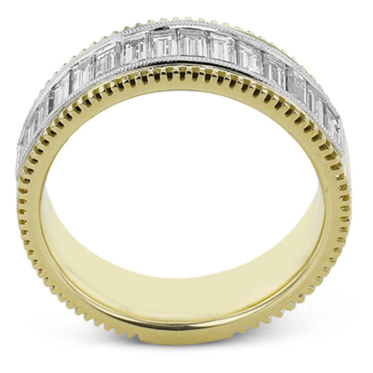 This two-tone right hand ring has a ribbed yellow gold band and sparkles with a row of baguette diamonds 1.0.7 ctw, accented by a delicate white gold beaded channel.