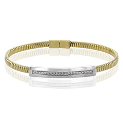 A perfect stacking bangle made of 18K yellow gold cable, adorned with a diamond plaque 0.23 ctw. and magnetic closure