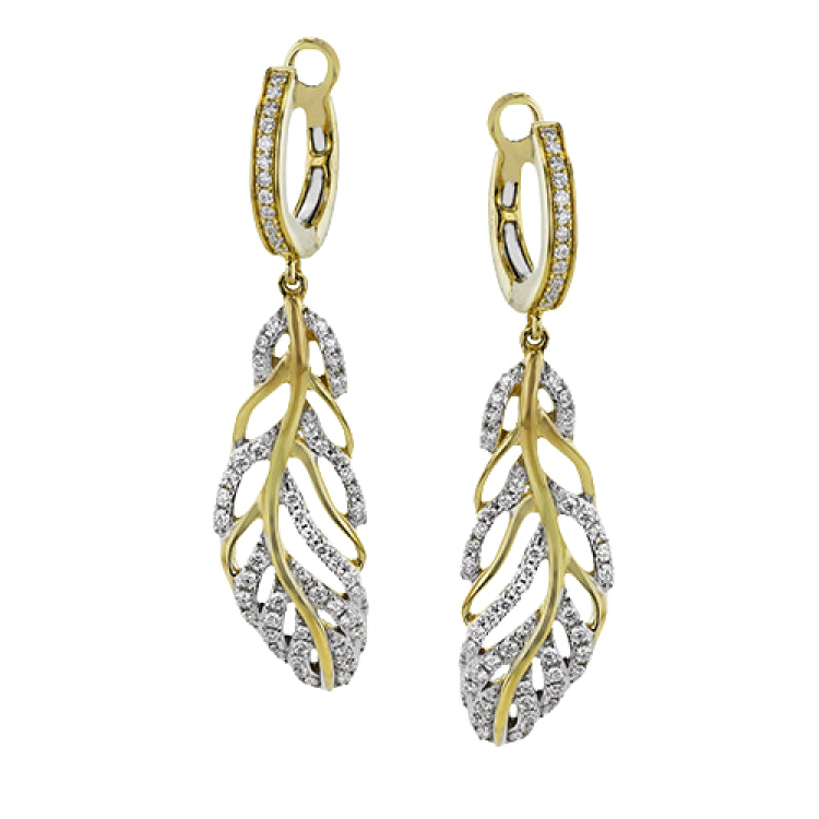 The perfect accessory for fall, these 18K yellow gold earrings inspired by nature feature .54ct of natural white diamonds.