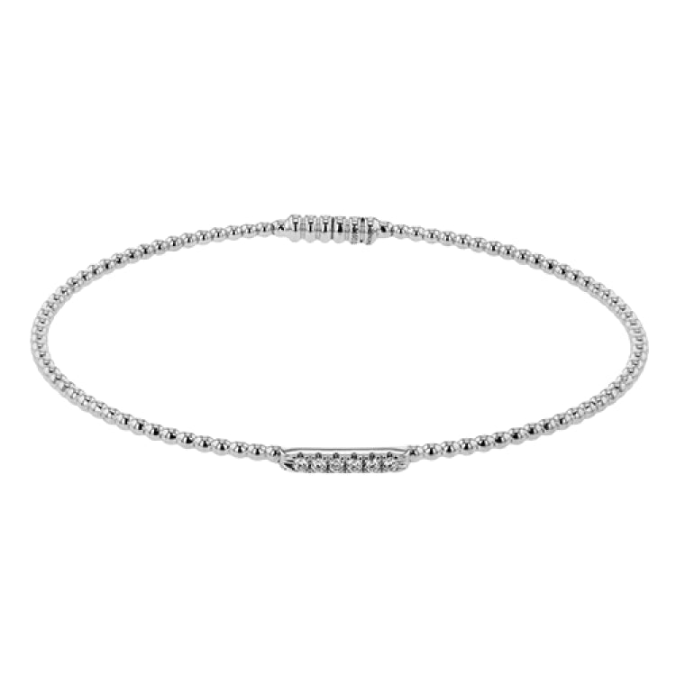 18K white gold beaded stackable bangle accented with 0.08 ctw of white diamonds, and a magnetic closure