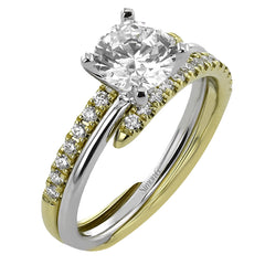 This two-tone engagement ring features a curved high polished white gold ring, complimented by an interlocking rose gold band with milgrain beading and 0.17 ctw of diamonds