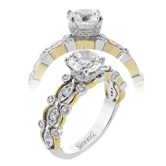 This 18K modern vintage engagement ring features a two-tone band with beaded wg bezel set diam 0.28 ctw, and high polish yg sections