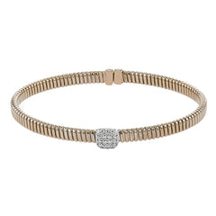This modern design 18k rose gold textured bangle with .19ctw diamonds set in a cushion shape and magnetic closure, is perfect for stacking