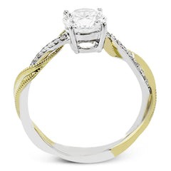 18K two-tone engagement ring has a delicate twist design with a polished yellow gold side trimmed with milgrain beading, and a diamond side 1/10 ctw. set in white gold