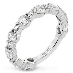 This brilliant diamond ring 2.07 ctw. in 18K white gold doubles as a wedding band and a stackable band, with a unique bubble design of alternating large and small round diamonds