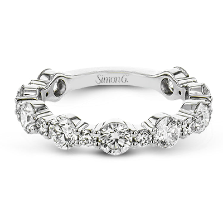 This brilliant diamond ring 2.07 ctw. in 18K white gold doubles as a wedding band and a stackable band, with a unique bubble design of alternating large and small round diamonds
