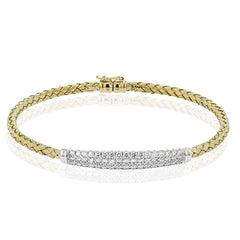 The perfect addition to any stack or worn alone, this 18K yellow gold bangle bracelet features 1.32cttw diamonds.
