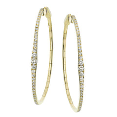 Oval statement hoops are the perfect compliment to day or night attire featuring 1.18cttw diamonds and set in 18K yellow gold.