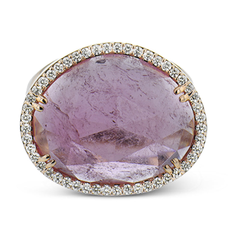 PINK POWER.  THIS 18K ROSE GOLD RING FEATURING A 14.88CT PINK TOURMALINE SURROUNDED BY .39CTTW DIAMONDS