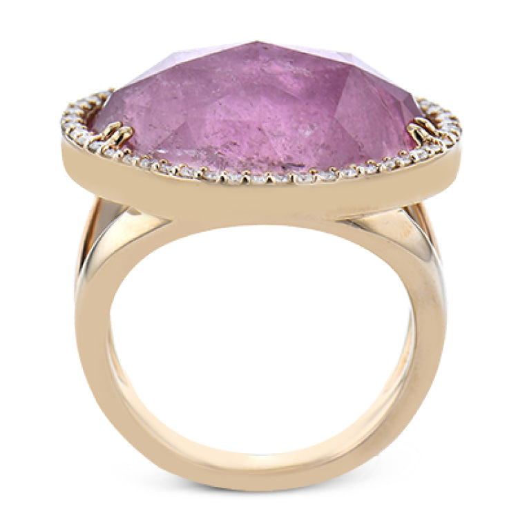 PINK POWER.  THIS 18K ROSE GOLD RING FEATURING A 14.88CT PINK TOURMALINE SURROUNDED BY .39CTTW DIAMONDS