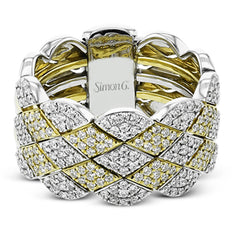 18k two tone contemporary right hand ring consists of 5 interlocking bands to create the look of of a single wide band and has 0.77 ctw of diamonds