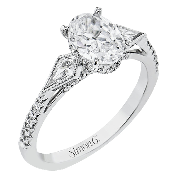 This modern 3 stone engagement ring is made for an oval center and flanked by 2 kite set diamonds 0.23 ctw, with round prong set diamonds along the shank 0.22 ctw.