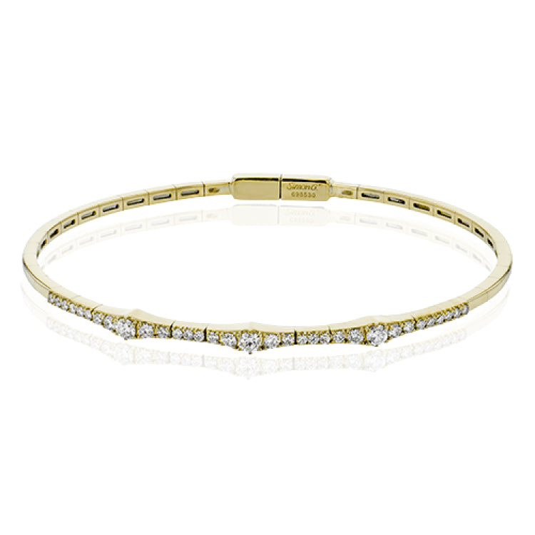 18K YG geometric bangle bracelet glistens with 0.61 ctw of diamonds
