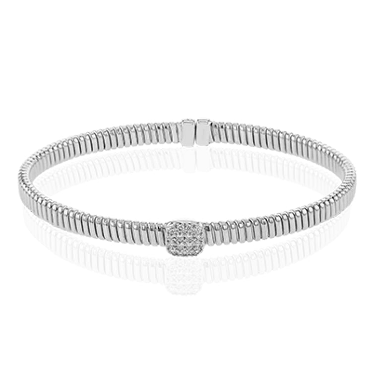 This modern design 18k white gold textured bangle with .19ctw diamonds set in a cushion shape and magnetic closure, is perfect for stacking