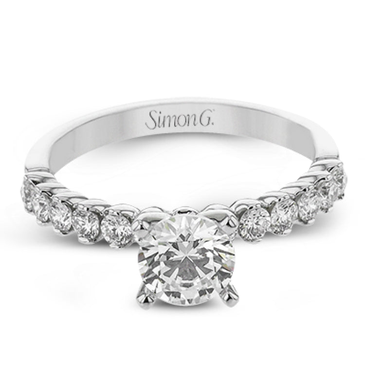18K diamond engagement ring 0.50 ctw., features a half bezel setting on each individual side diamond which adds a modern bubble look to this ring