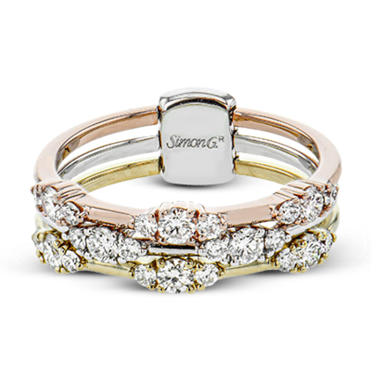 This three row ring gives the look of stacked bands but the comfort and security of one ring.  Created in 18k white, yellow and rose gold and featuring .65cttw diamonds, this ring pairs perfectly with any look.