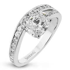 This modern engagement ring from our Lightning collection showcases a row of channel set diamonds 0.35 ctw., in a dynamic design featuring an Oval main center diamond.