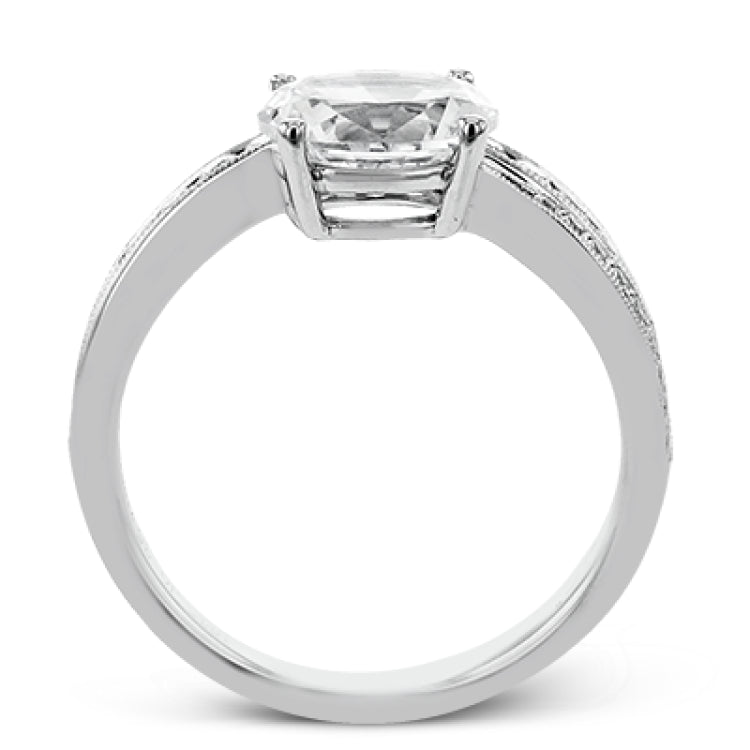 This modern engagement ring from our Lightning collection showcases a row of channel set diamonds 0.35 ctw., in a dynamic design featuring an Oval main center diamond.