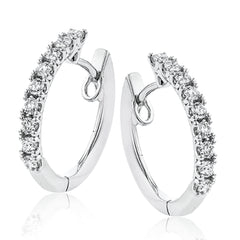 Our beautiful white gold 1/2 carat diamond hoop earrings are prong set with .47 ctw of diamonds