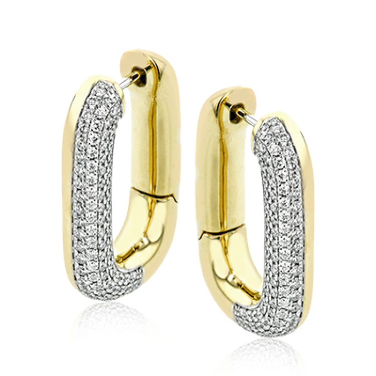 An every day classic, these 18K white and yellow gold earrings feature .79cttw diamonds.
