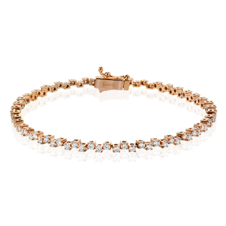 This lovely 18k rose gold bracelet adds the ideal touch of sparkle and shine to any outfit with 2.00 ctw of white diamonds.