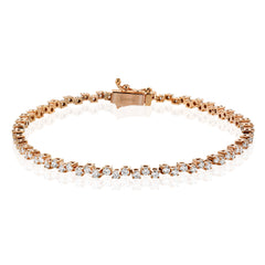 This lovely 18k rose gold bracelet adds the ideal touch of sparkle and shine to any outfit with 2.00 ctw of white diamonds.