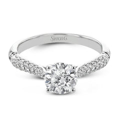 The best of art deco design is updated to the modern era in this Roxy Collection ring, with milgrain edged bezel-set side diamonds and shining white gold.