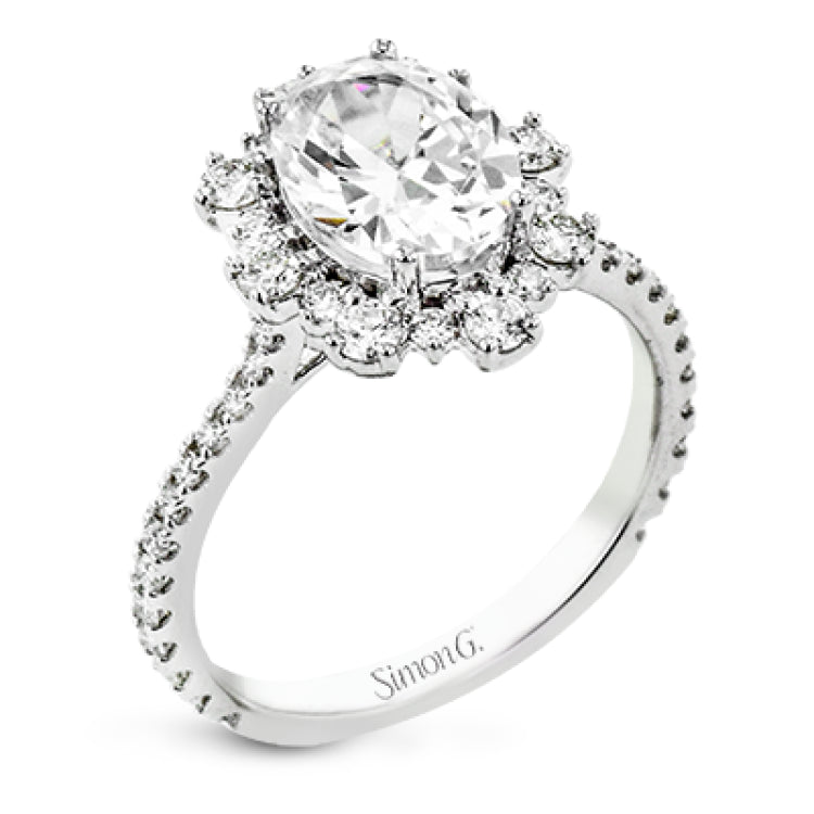 A geometric halo of diamonds in this Supernova Collection engagement ring replicates the effect of a thousand stars.