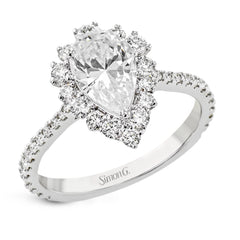 This Supernova Collection engagement ring is built specially for a pear-shaped center stone, with a wonderful halo of diamonds twinkling like starry skies.