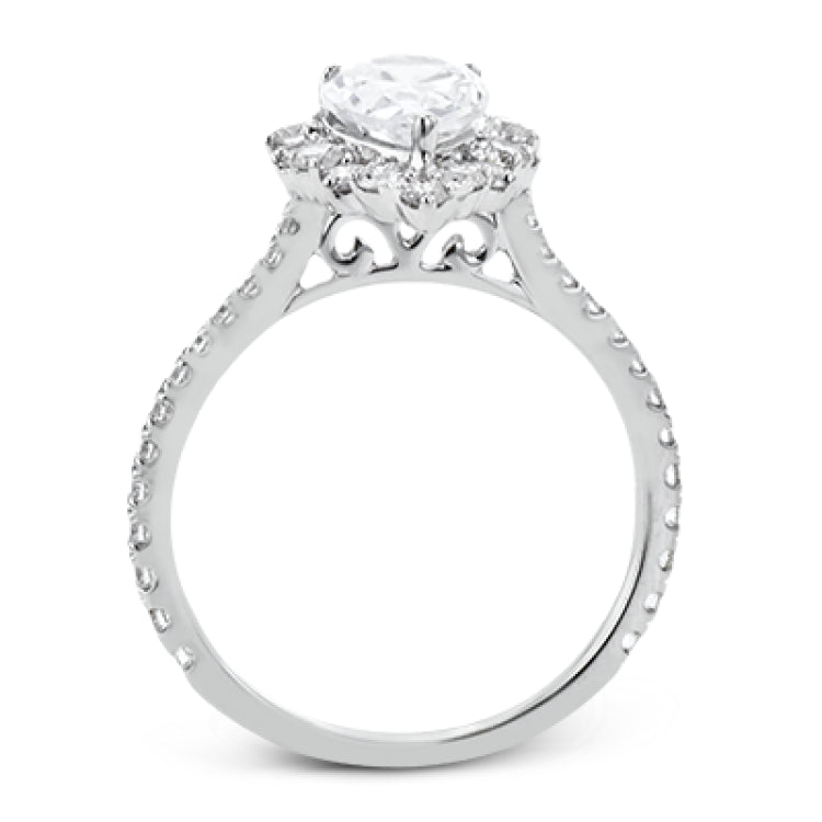 This Supernova Collection engagement ring is built specially for a pear-shaped center stone, with a wonderful halo of diamonds twinkling like starry skies.