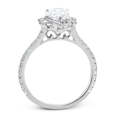 This Supernova Collection engagement ring is built specially for a pear-shaped center stone, with a wonderful halo of diamonds twinkling like starry skies.