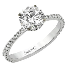 This new take on a classic engagement ring setting is part of our Underhalo Collection, where a circle of diamonds sits snugly around the side of the center stone, giving the perfect touch of sparkle from every angle.