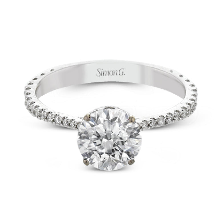 This new take on a classic engagement ring setting is part of our Underhalo Collection, where a circle of diamonds sits snugly around the side of the center stone, giving the perfect touch of sparkle from every angle.
