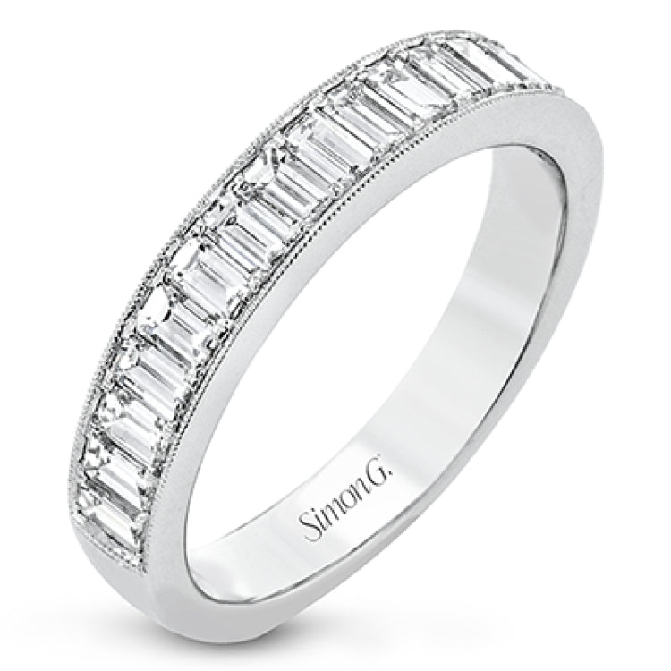 This gorgeous anniversary band is the perfect selection for those who seek a luxurious style to accompany any engagement ring, it features 1.06 cttw baguette diamonds with milgrain edges