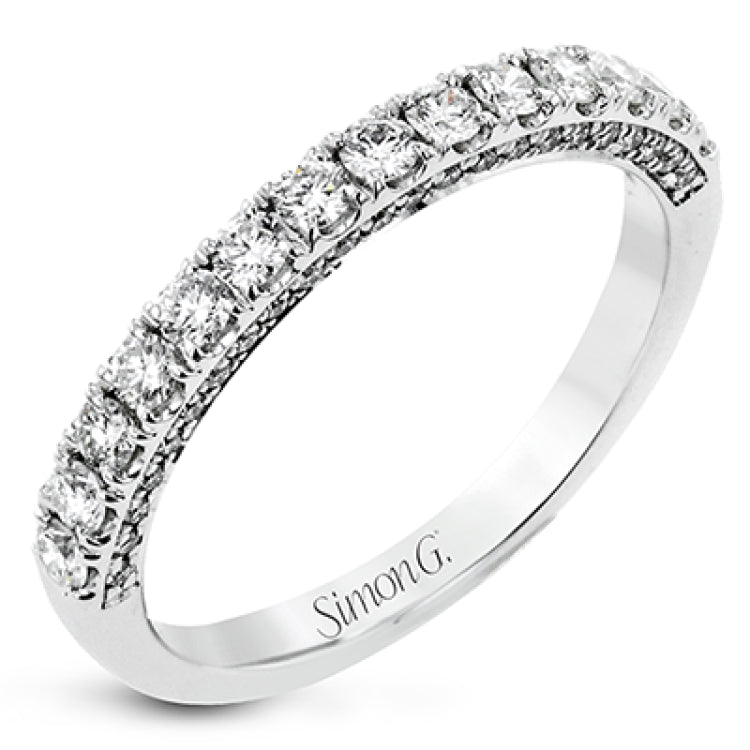 A classic, this 18K white gold diamond band features .57cttw white diamonds.