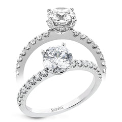 18K White Gold engagement ring featuring .29cttw diamonds. (center stone sold separately)