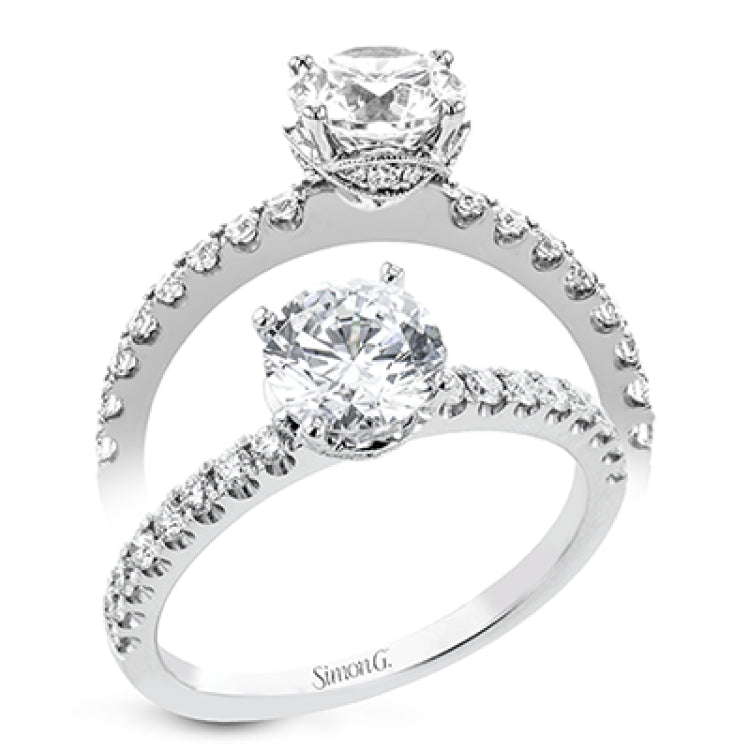 18K White Gold engagement ring featuring .29cttw diamonds. (center stone sold separately)