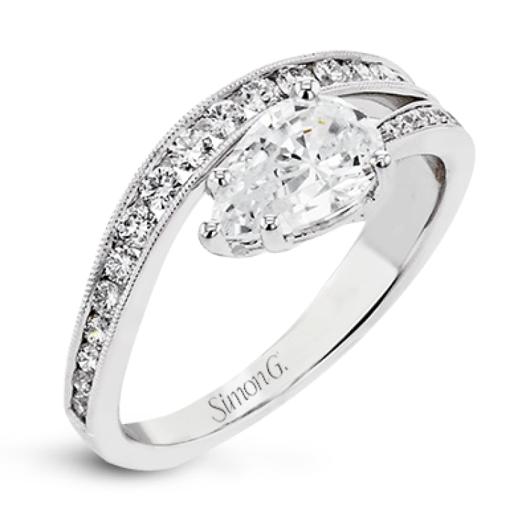 Bold shapes crafted in 18k white gold and diamonds make this ring unforgettable.
