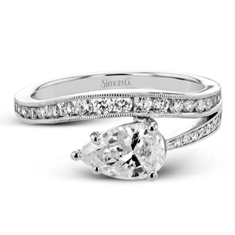 Bold shapes crafted in 18k white gold and diamonds make this ring unforgettable.